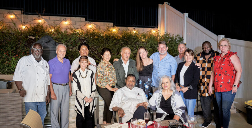 Group of men and women gathering for a Holiday Party in Southern California